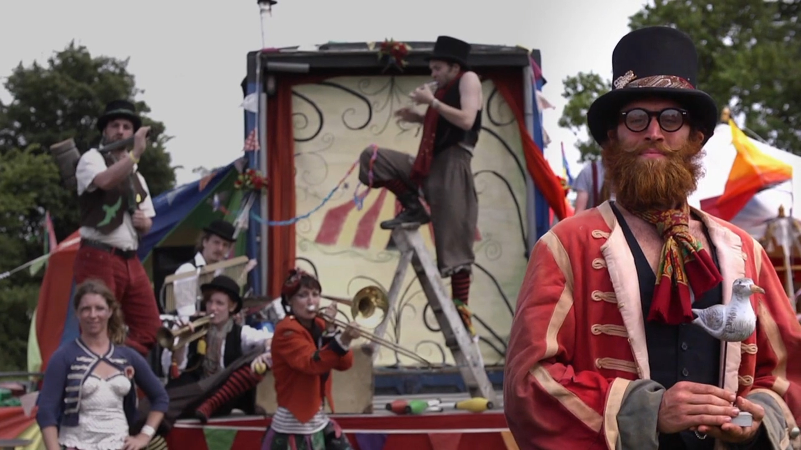 A troupe of performers at Glastonbury music festival.